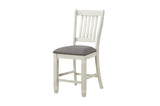 Storage detail of antique white dining table