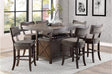 Oxton dining set main view showcasing rustic solid wood table and fabric upholstered storage chairs