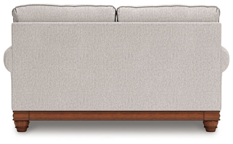 Clearbrooke loveseat back view with wraparound base