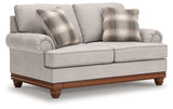 Clearbrooke loveseat head-on view showing cushions and legs