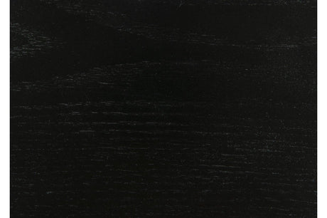 Side angle detail of dining table and arm of chair
