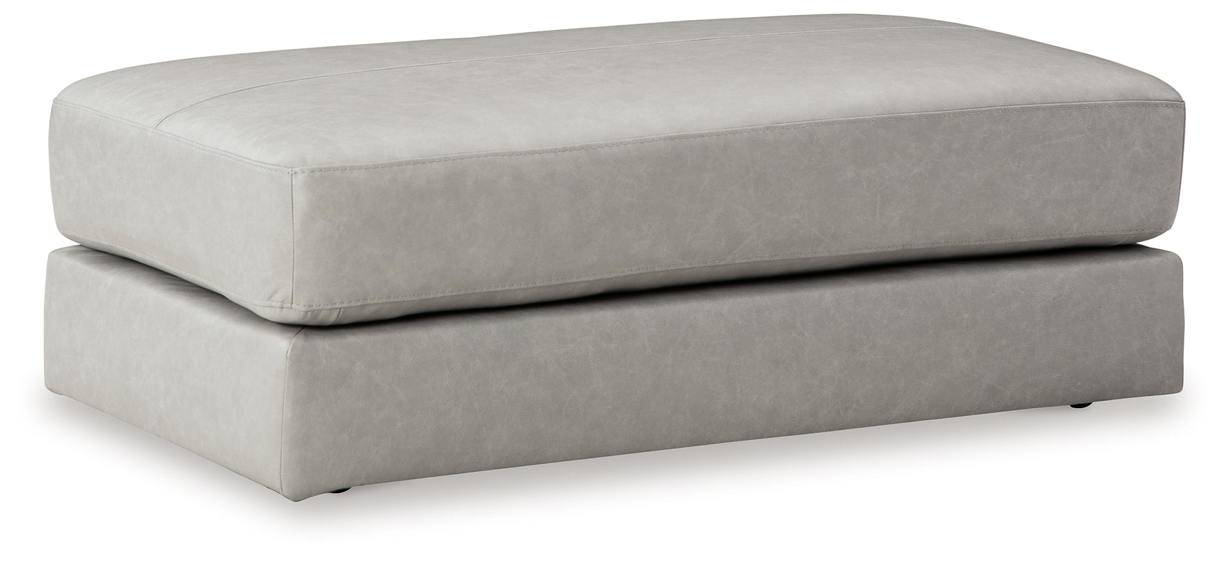 Room angle view featuring Amiata Glacier sectional with ottoman