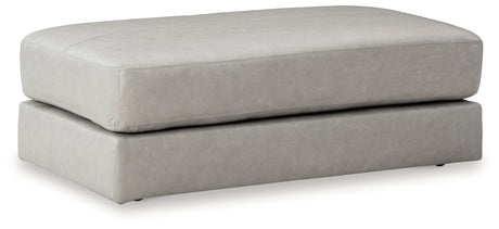 Room angle view featuring Amiata Glacier sectional with ottoman