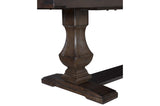 Side view of bench with fabric upholstery and wooden frame