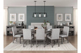 detail of gray fabric upholstery on dining chair