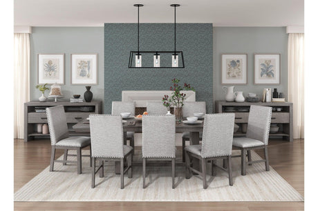 detail of gray fabric upholstery on dining chair