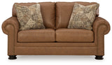 side angle of loveseat in caramel upholstery
