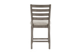Side angle showing table legs and chair upholstery