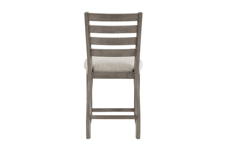 Side angle showing table legs and chair upholstery