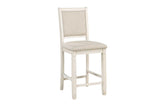side view detail of light brown fabric chair and white table base