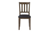 Side view of upholstered chair in Faust Charcoal Brown dining set