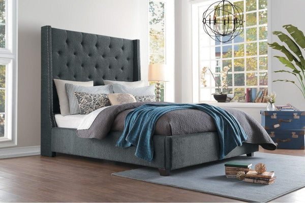 Fairborn Gray king bed angled view showing tufted headboard