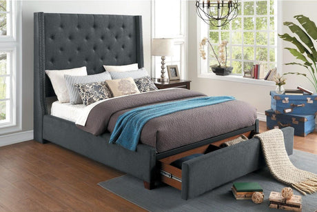 Storage drawer under footboard open showing interior space
