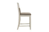 rear angle of chairs around Stowe White Gray Dining Table
