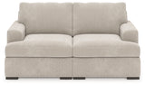 Detail view of plush upholstery on sectional sofa