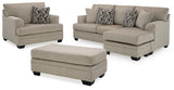 Taupe upholstered chair included in Stonemeade set