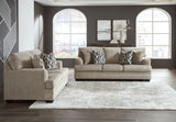 Stonemeade taupe sofa, loveseat, chair and ottoman set front view