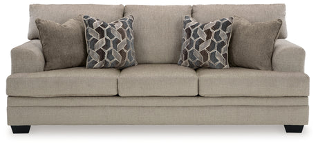 Side close-up of sofa arm and cushion