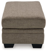 side angle of Stonemeade Nutmeg chair and ottoman