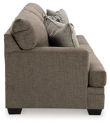 side close-up of chair armrest in Nutmeg fabric