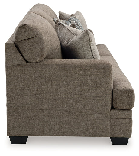 side close-up of chair armrest in Nutmeg fabric