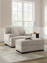 Taupe Profile Chair angled view with ottoman