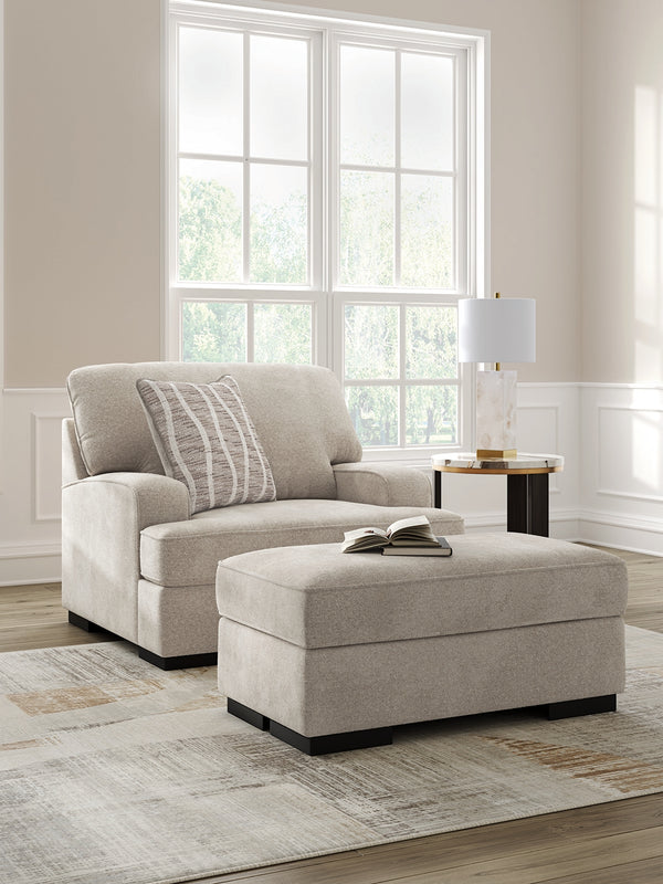 Taupe Profile Chair angled view with ottoman