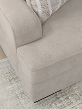 Close-up detail of chenille fabric upholstery and stitching