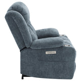 Recliner in living room setting with pillow and blanket