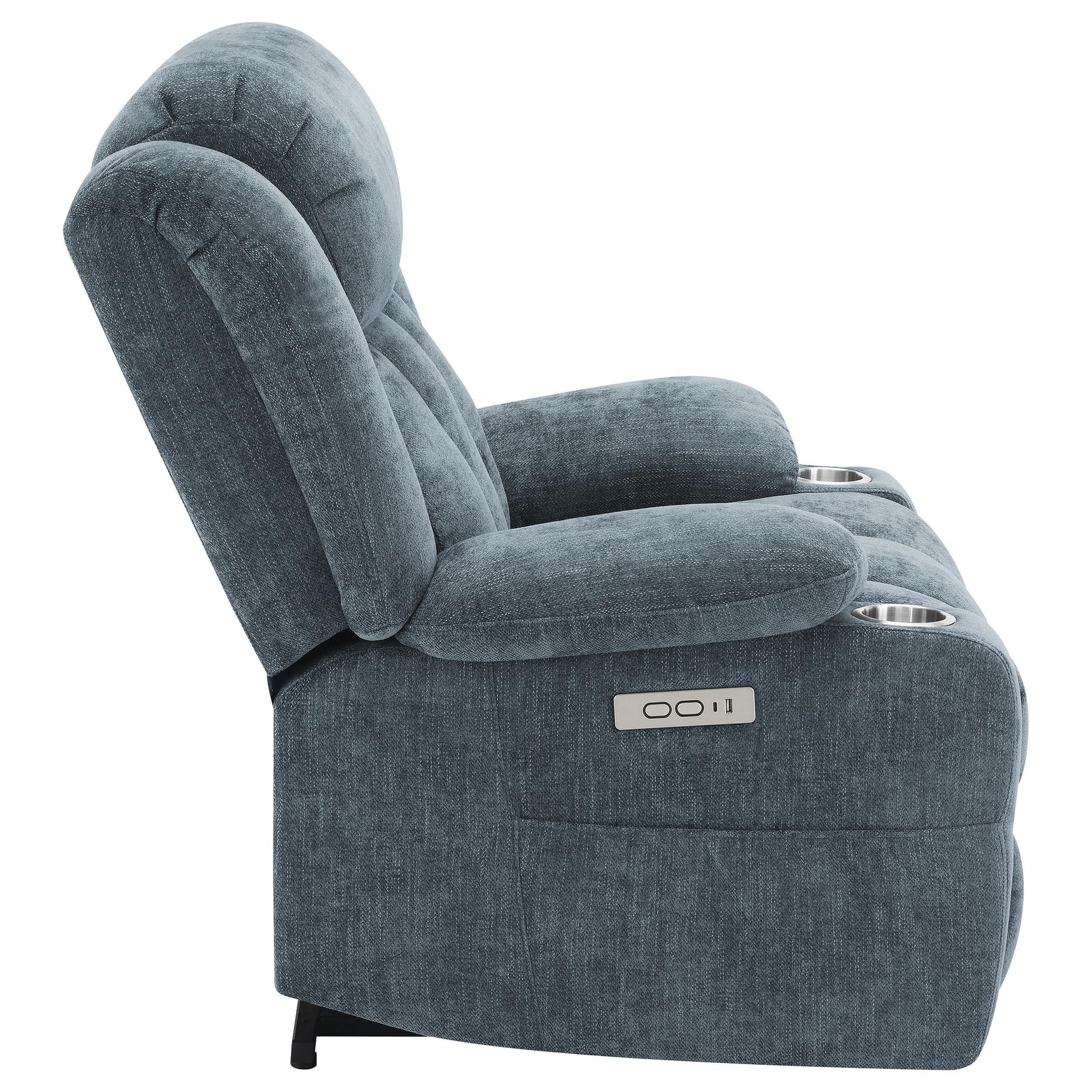 Recliner in living room setting with pillow and blanket