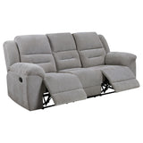 Soft-close storage compartment in sofa arm