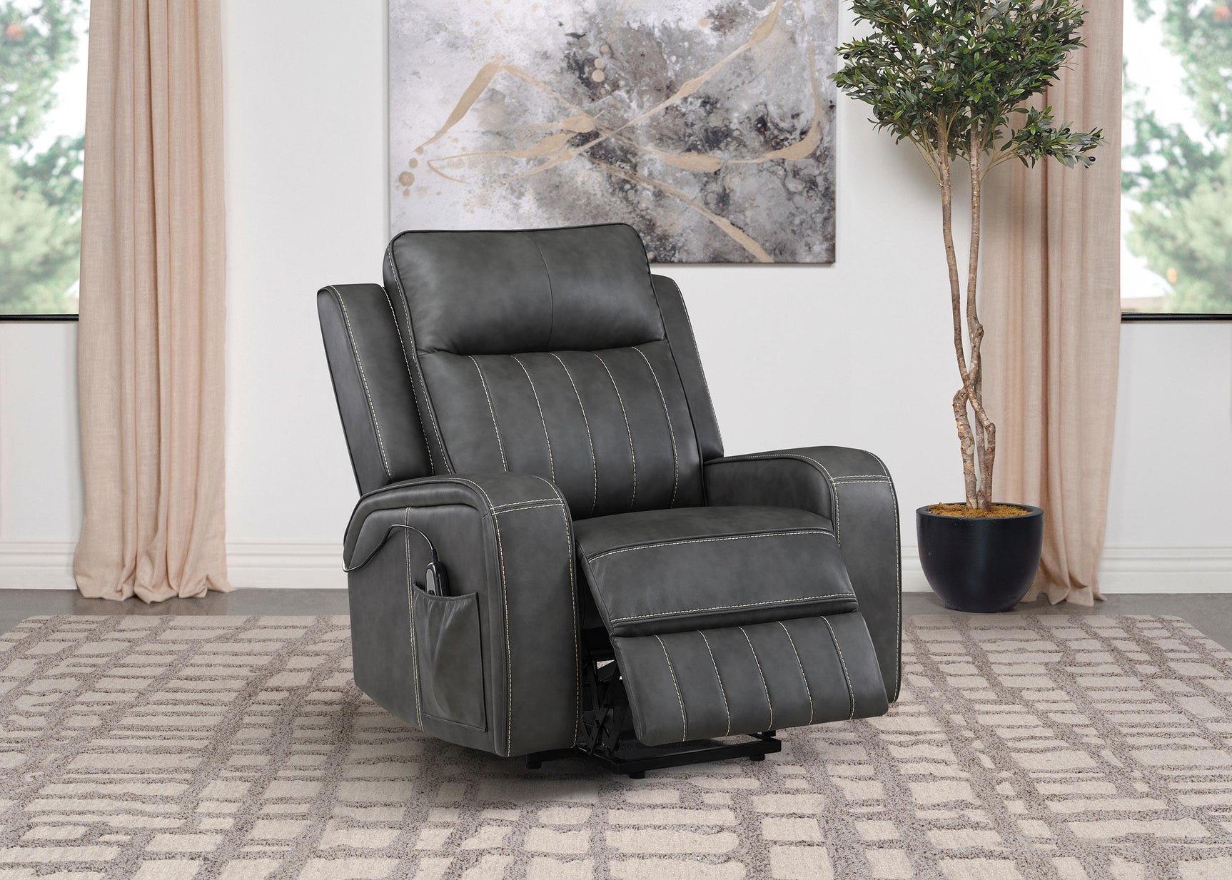 Raelynn recliner chair showing control remote on side