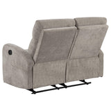 Reclining footrest extended on loveseat