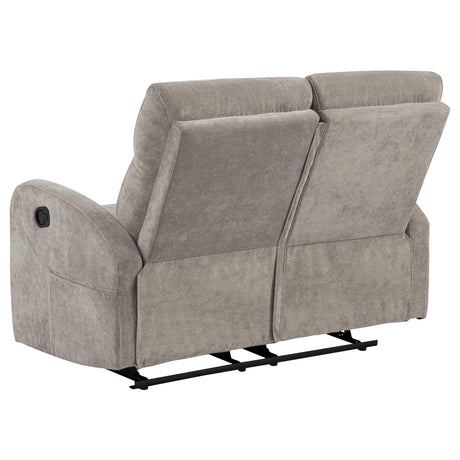 Reclining footrest extended on loveseat