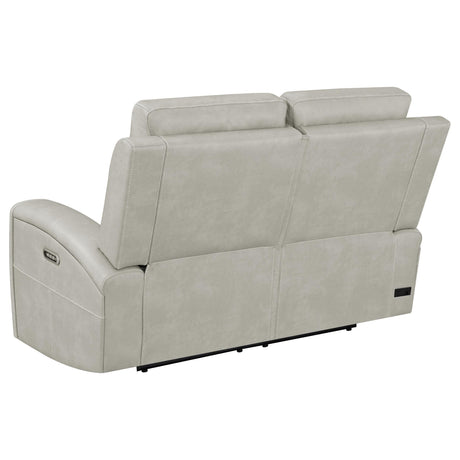 Armrest cup holder on grey loveseat