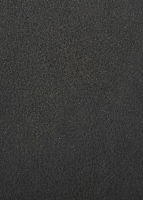 Lawrence Recliner showing side profile and armrest