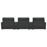 Pillow-top armrests on dark grey fabric seating