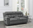 Bahrain grey upholstered motion loveseat with tufted back and built-in console, side angle
