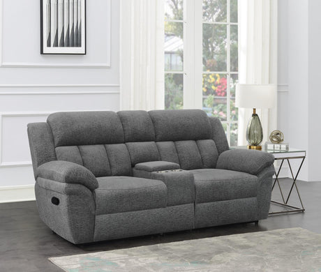 Bahrain grey upholstered motion loveseat with tufted back and built-in console, side angle
