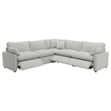 Sectional sofa showing power recliner button detail