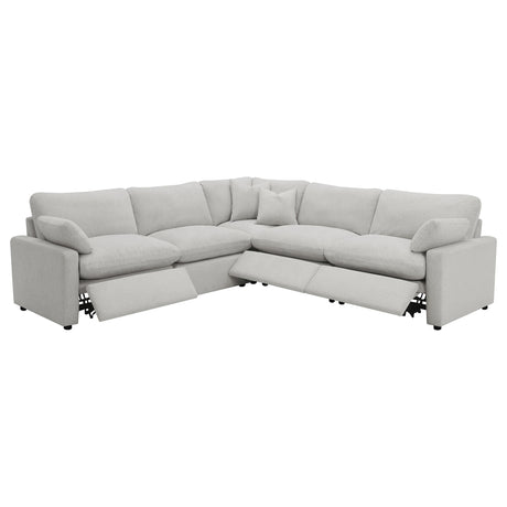 Sectional sofa showing power recliner button detail
