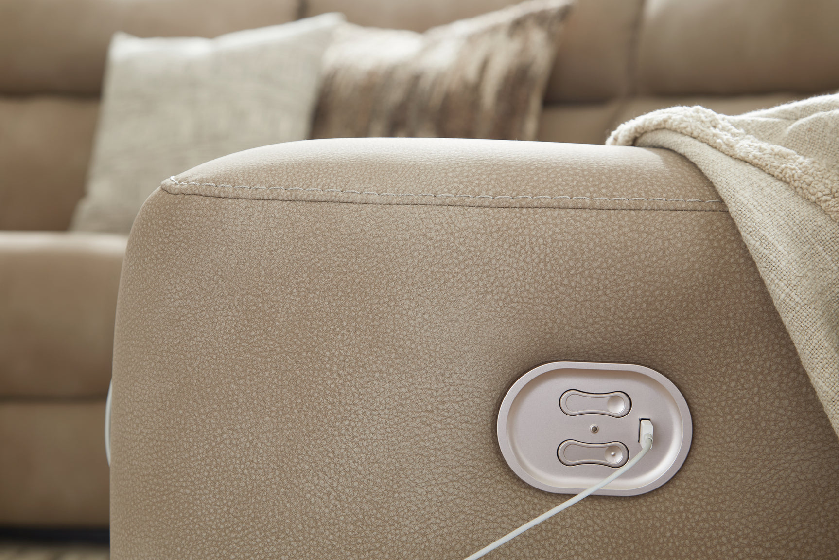 Close-up of USB charging port on recliner
