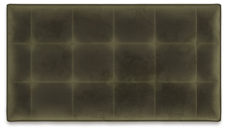 Close-up detail of tufted olive velvet upholstery
