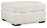 Living room view of Chessington Ivory 2-Piece Sectional Sofa with Ottoman