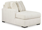 Room angle view of Chessington Ivory 2-Piece Sectional with Ottoman