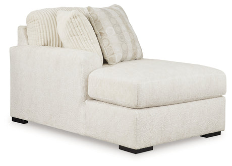 Room angle view of Chessington Ivory 2-Piece Sectional with Ottoman