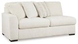 Side view of Chessington Ivory 2-Piece Sectional Sofa with Ottoman