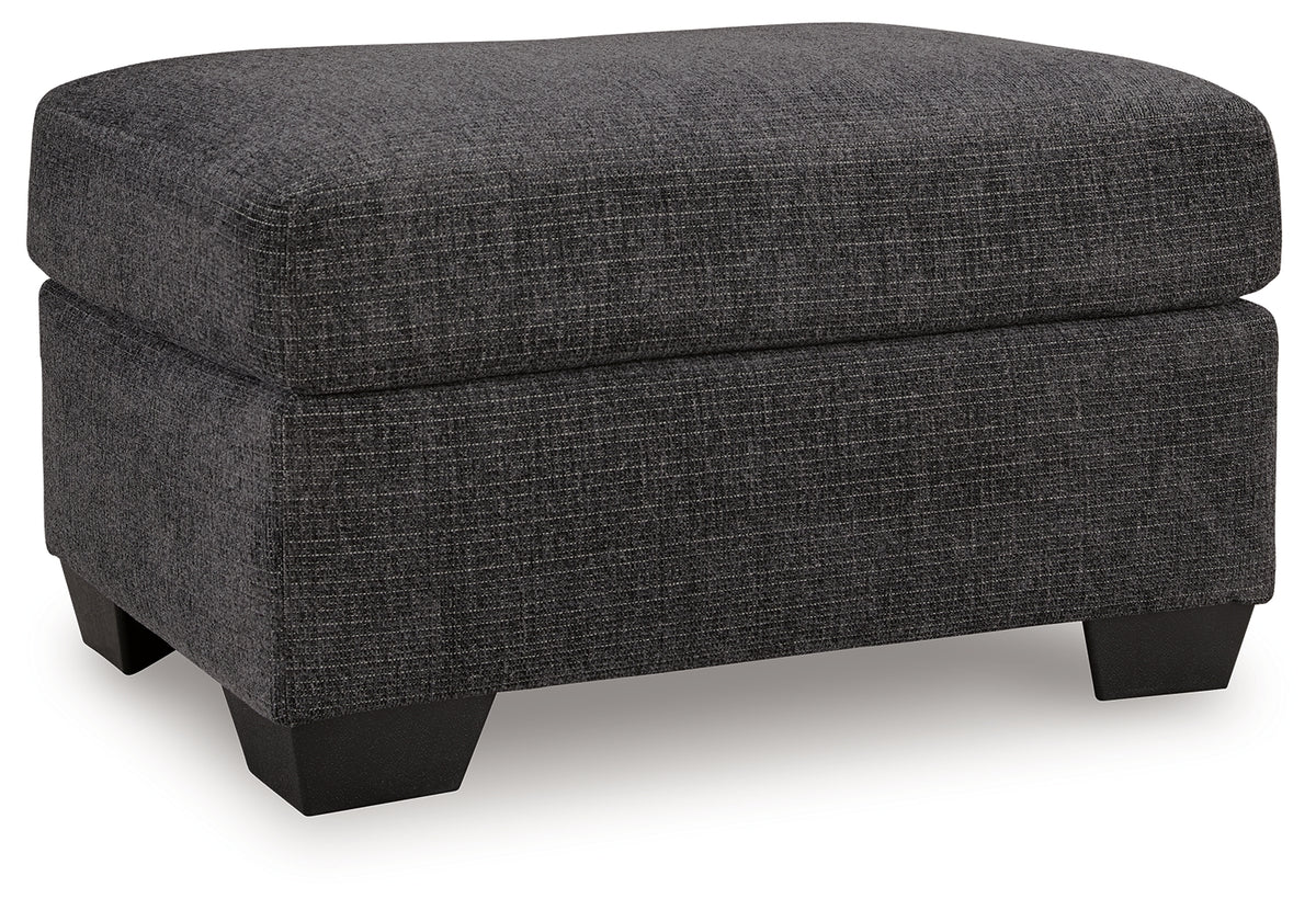 Loreo Ottoman side view showing chenille fabric texture