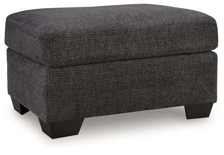 Loreo Ottoman side view showing chenille fabric texture