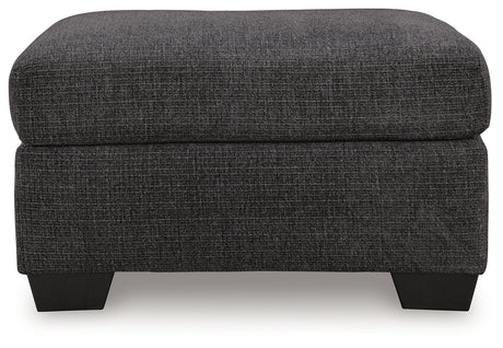 Loreo Ottoman head-on view with exposed faux wood legs